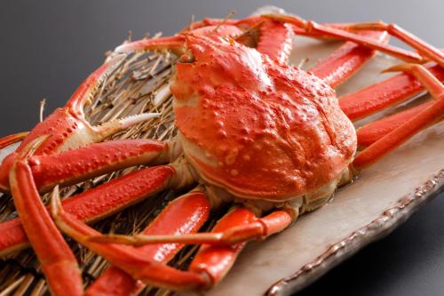 a close up of a lobster on a plate at Kaikatei Hanagozen in Kyotango