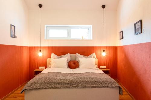 Postel nebo postele na pokoji v ubytování BachBett - modernes Gästehaus im Salzkammergut