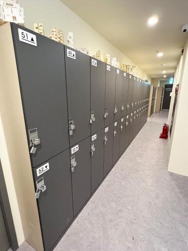 a row of lockers in a locker room at Seoul Cube Jongro in Seoul