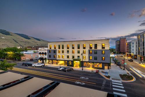 a building on a city street with cars parked in front at The Wren in Missoula