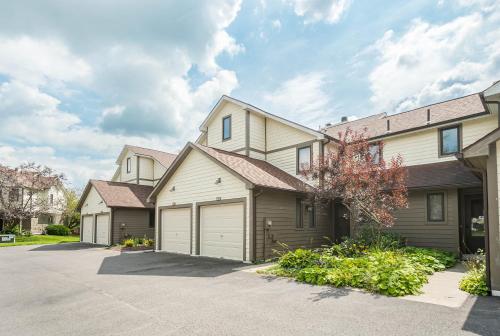 a house with two garages and a garage at Ski Harbor 14 in McHenry