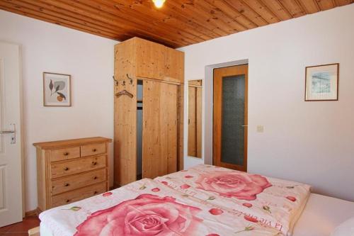 Ένα ή περισσότερα κρεβάτια σε δωμάτιο στο Alpenpension Watzmannblick