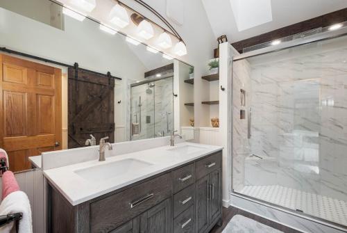 a bathroom with a large sink and a shower at Slope Side in McHenry