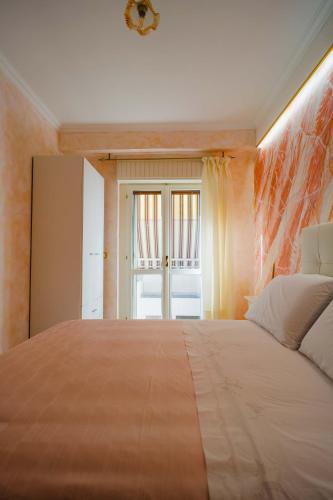 Ein Bett oder Betten in einem Zimmer der Unterkunft Adriana's Home