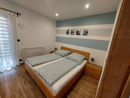 Postel nebo postele na pokoji v ubytování Ferienwohnung-Bergblick