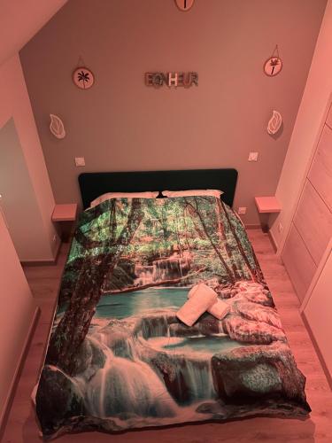 En eller flere senge i et værelse på L'Atypique ,maison individuelle Wifi et Netflix gratuit