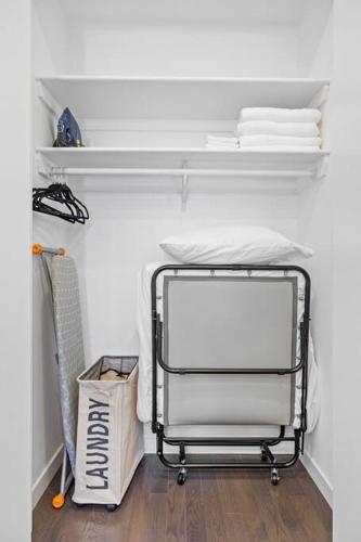 a towel rack in a room with a shelf at SWJ 3rd - Sleeps 7,Close to LGA,Times Sq in 25 min in New York