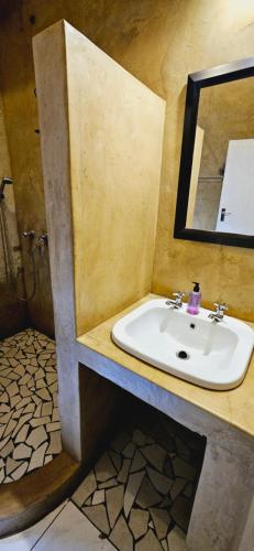 Ένα μπάνιο στο Old Vic Travellers Inn Nelspruit