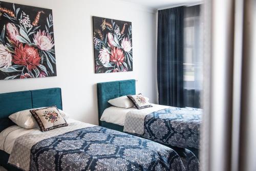 Llit o llits en una habitació de Studio apartment in Joniškis