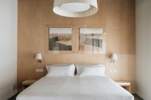 Postel nebo postele na pokoji v ubytování Hotel Santa Ana Tudela