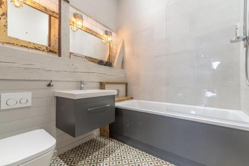 Vannituba majutusasutuses Cog Cottage