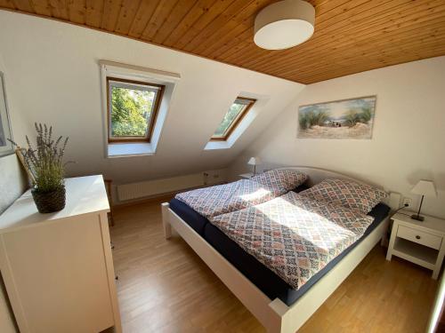 Voodi või voodid majutusasutuse Ferienwohnung zwischen Wald und See toas