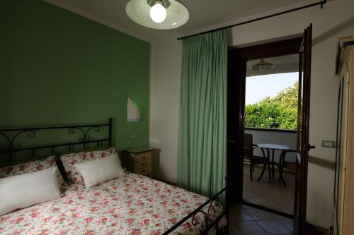 En eller flere senge i et værelse på Agriturismo Torre dei Preti