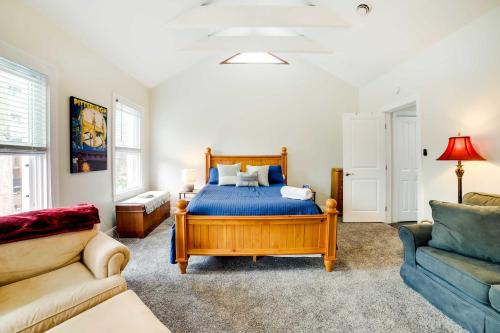 a bedroom with a bed and a couch at Pet-Friendly Home - 100 Feet to Walnut Street in Pittsburgh