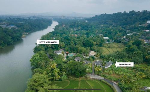 an aerial view of a town next to a river at Surveyor's Residence Bungalow in Kandy