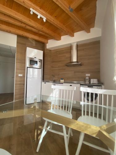Η κουζίνα ή μικρή κουζίνα στο Apartamentos Palacio Alemar