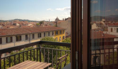 a view of a city from a balcony at Hotel Meridiana in Florence