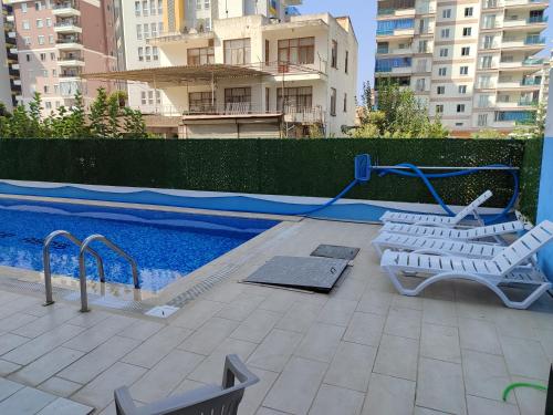 Bazén v ubytování Alanya Mahmutlar nebo v jeho okolí