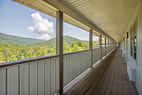 a balcony with a view of the mountains at Massanuttens Shenandoah Villas by TripForth in McGaheysville