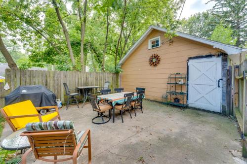 a backyard with a table and chairs and a shed at Pet-Friendly Home with Views of Lake Delavan! in Delavan