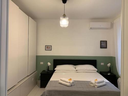 Voodi või voodid majutusasutuse "CITY CENTER 10Stars"- Casetta Matteotti- Feel like HOME toas