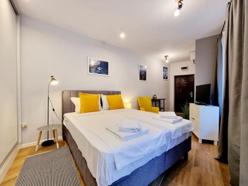 En eller flere senge i et værelse på Studio Blumar 1 in Super Center