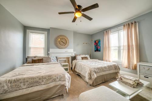 a bedroom with two beds and a ceiling fan at Pittsburgh Vacation Rental about 6 Mi to Downtown! in Pittsburgh