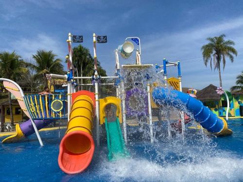 a water park with a water slide at Aldeia das Aguas Village in Barra do Piraí