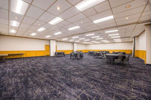 a large room with chairs and tables in it at Quality Inn & Suites Canon City in Canon City
