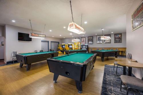 a billiard room with four pool tables in it at Quality Inn & Suites Canon City in Canon City