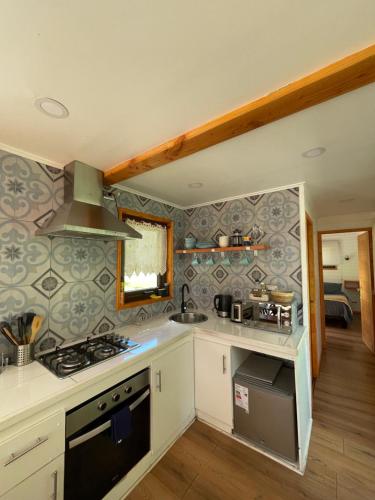 A cozinha ou cozinha compacta de Huella Patagonia Lodge