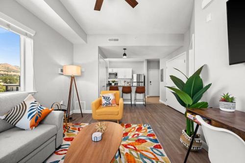 a living room with a couch and a table at Central City Escape in Salt Lake City
