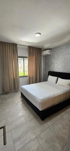 Katil atau katil-katil dalam bilik di Appartements Rihana Family Only