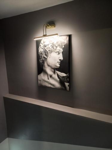 a picture of a bust of a woman on a wall at GRANDAURA EDıRNE in Edirne