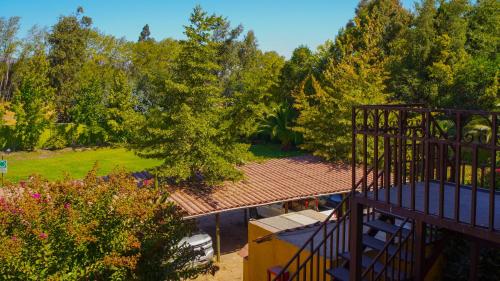an overhead view of a garden with trees and a building at Hotel Ontiveros in San Fernando