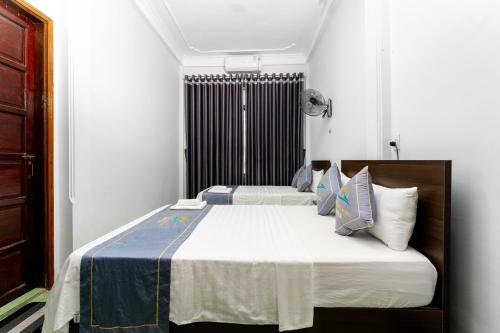 Tan Hoang Minh Hotelにあるベッド