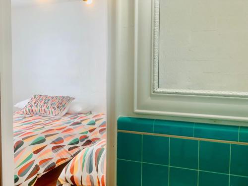 Ένα ή περισσότερα κρεβάτια σε δωμάτιο στο Dragonfly Motor Lodge