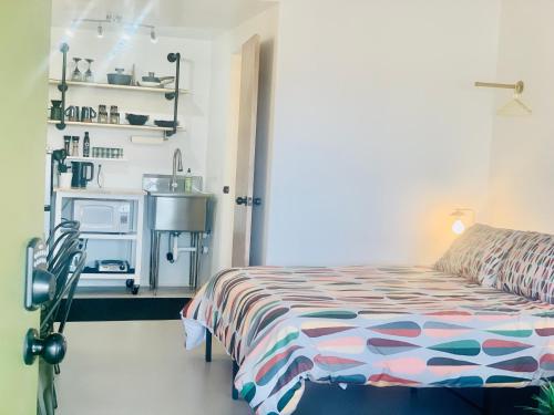 Ένα ή περισσότερα κρεβάτια σε δωμάτιο στο Dragonfly Motor Lodge