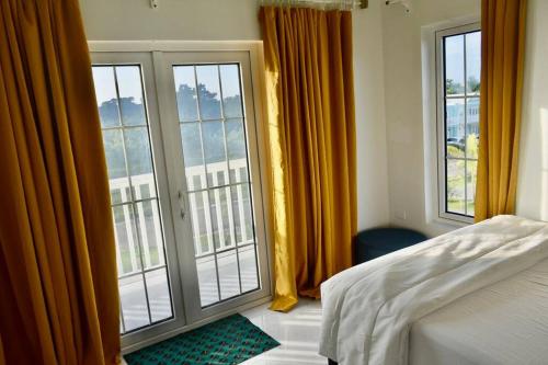 Postel nebo postele na pokoji v ubytování Irie Vibes Ocean View