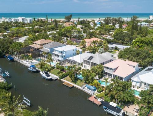 an aerial view of a resort with a marina at Isla Amor - 86 in Siesta Key