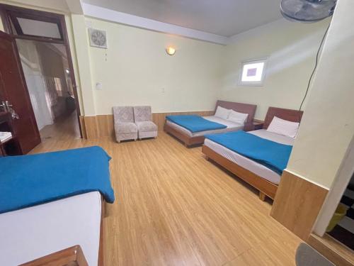 Postel nebo postele na pokoji v ubytování Hân Hoan Hotel