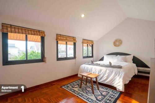 Postel nebo postele na pokoji v ubytování Cozy Living House Chiang Mai - Groups & Families