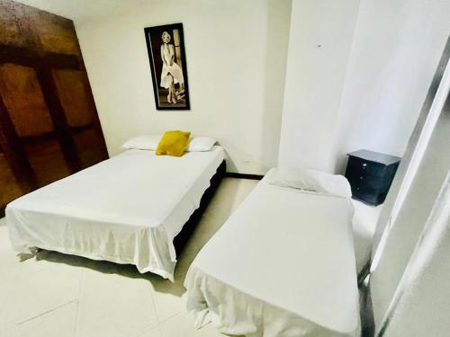 Hermoso apartamento en la Floresta - Medellin房間的床
