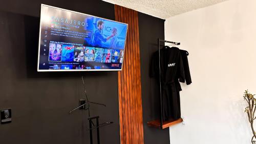 Homstyにあるテレビまたはエンターテインメントセンター