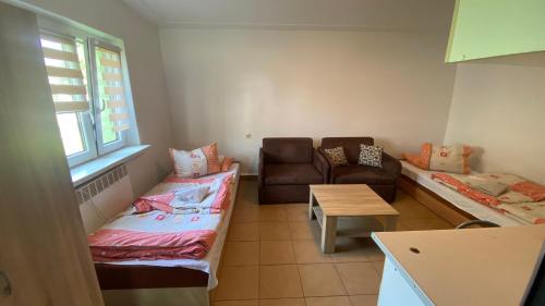 Postel nebo postele na pokoji v ubytování Kemping Obora