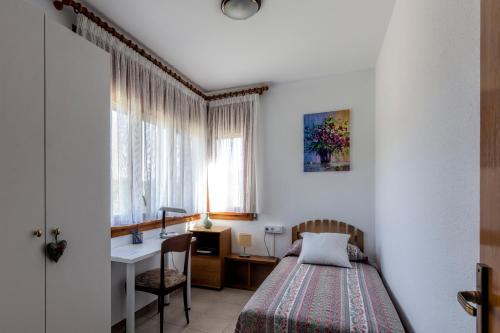 מיטה או מיטות בחדר ב-Mas Espuña Turisme Entorn Rural
