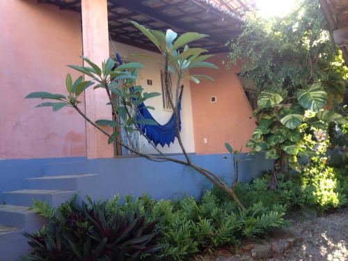 a house with stairs and plants in front of it at Stay Cool Pipa in Pipa