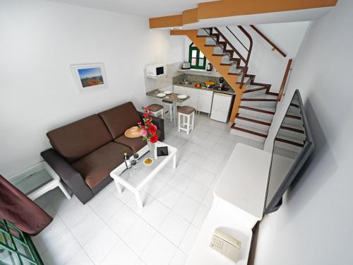 an overhead view of a living room and kitchen at Bungalows Vistaflor in Maspalomas