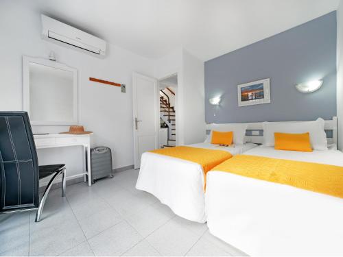 Posteľ alebo postele v izbe v ubytovaní Bungalows Vistaflor