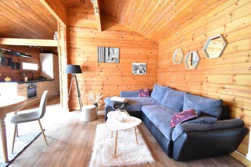 Ruang duduk di Chalet cosy, cadre apaisant